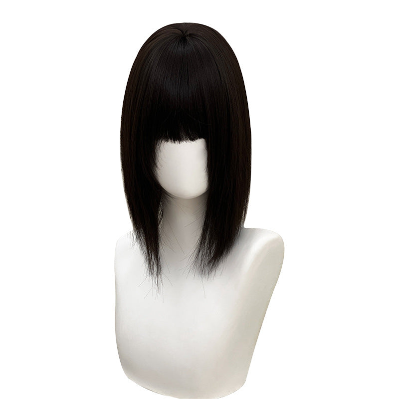 A female head cover with straight hair on top