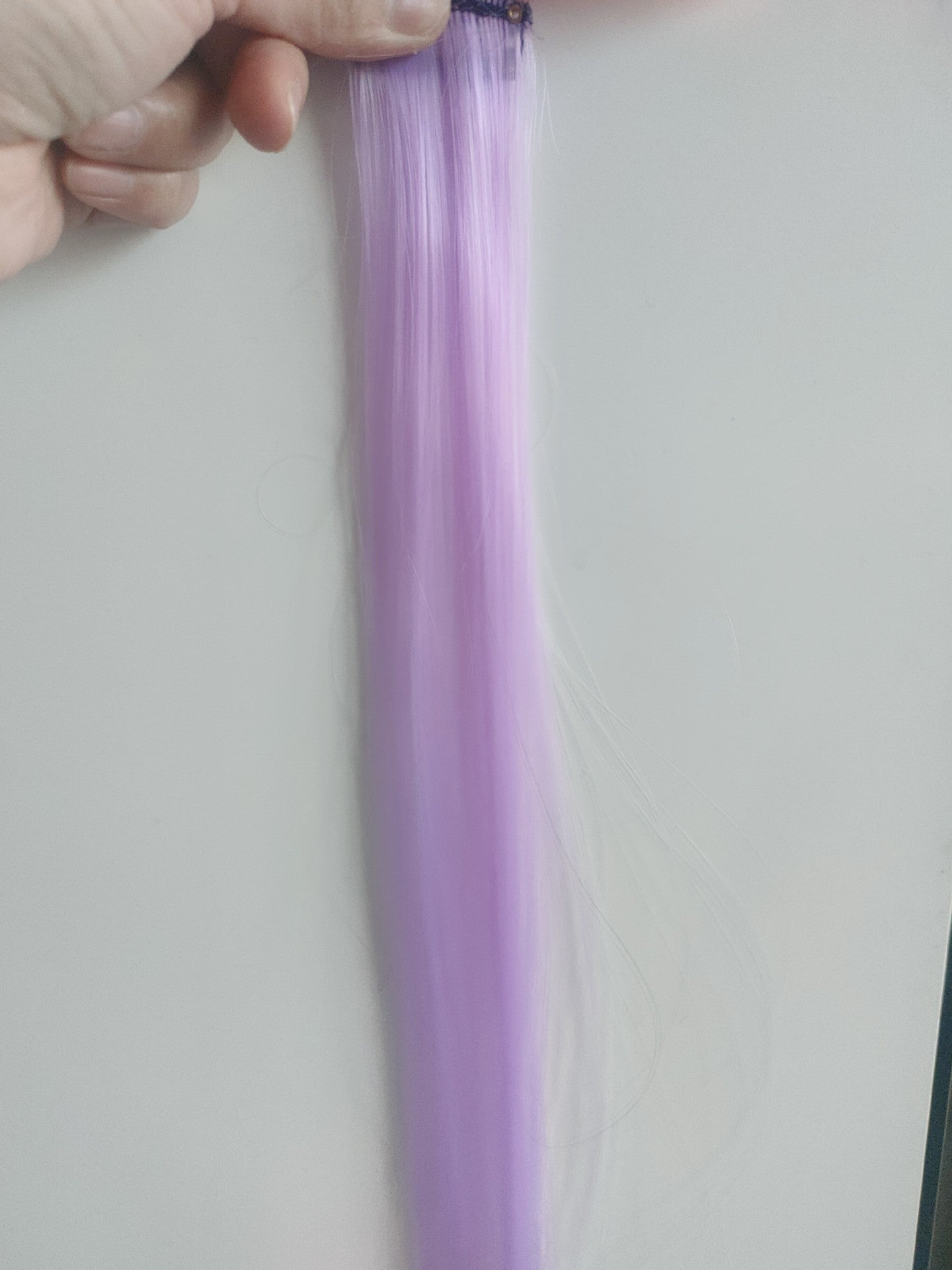 Wig pieces are dyed and dyed in various lengths