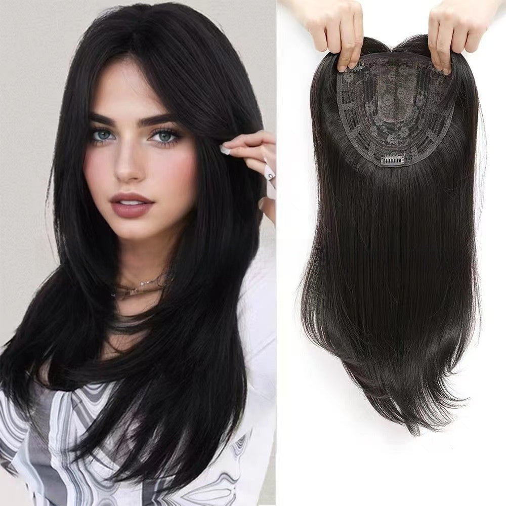 A wig for hair replacement on the top of the head