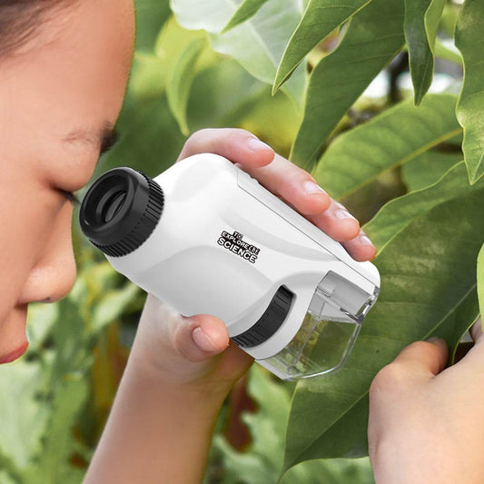 A child holding a microscope - Price Value Store
