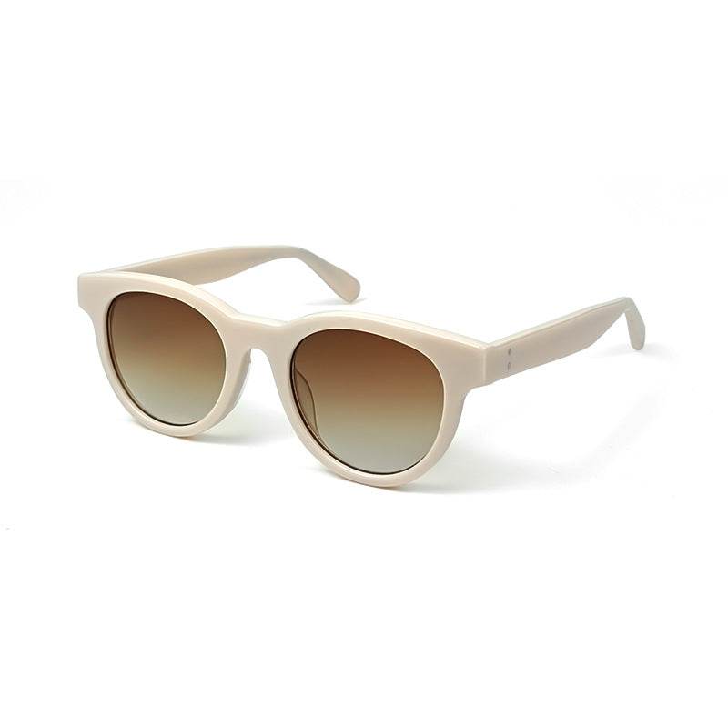 A woman wearing cat-eye sunglasses - Price Value Store