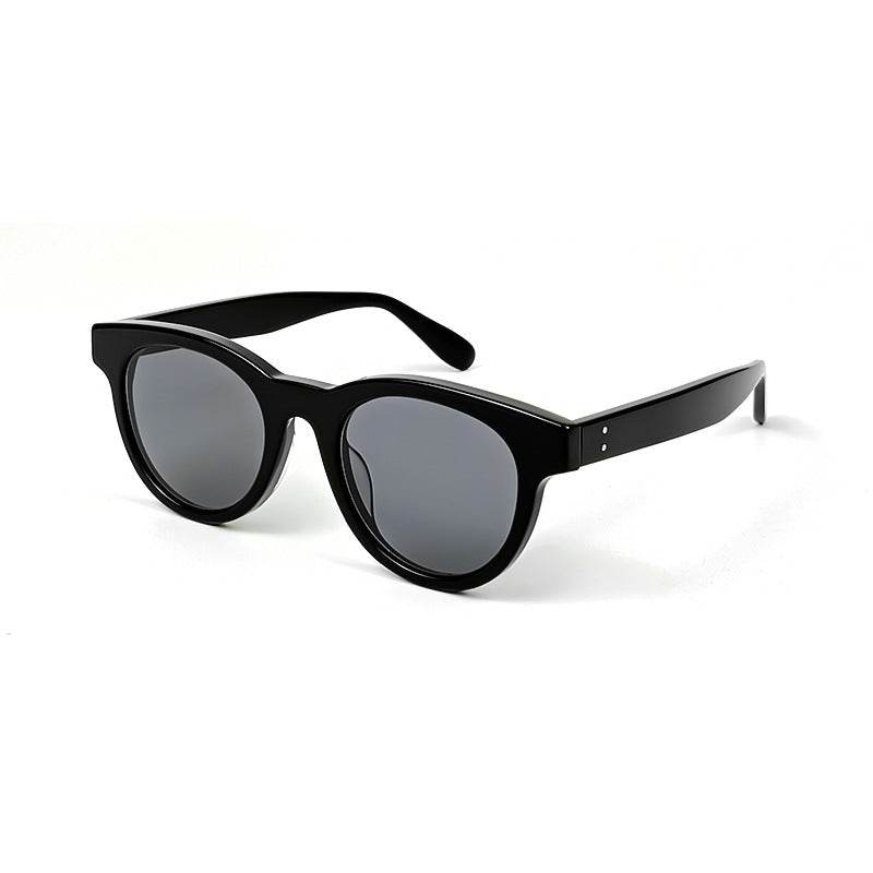 A woman wearing cat-eye sunglasses - Price Value Store