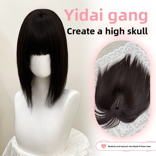 A female head cover with straight hair on top