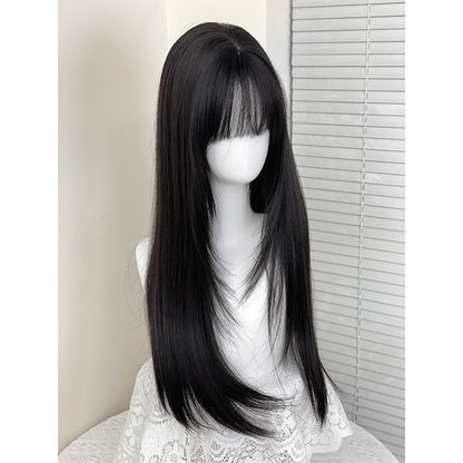 Long black and brown hair with a layered look