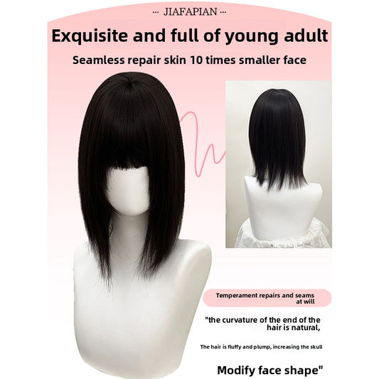 A female head cover with straight hair on top