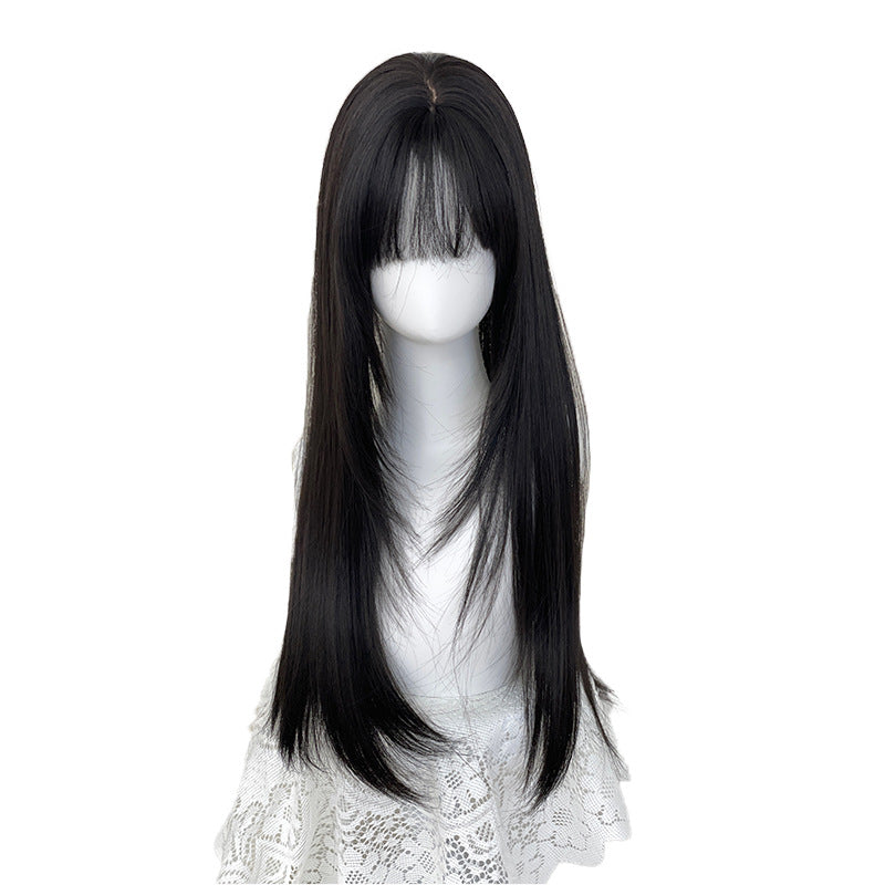Long black and brown hair with a layered look