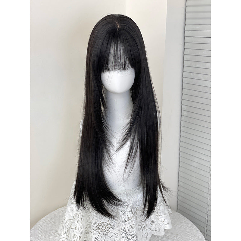Long black and brown hair with a layered look