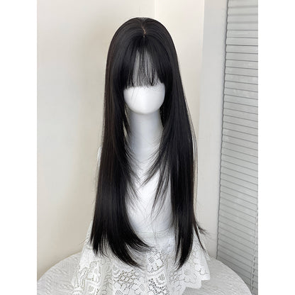Long black and brown hair with a layered look