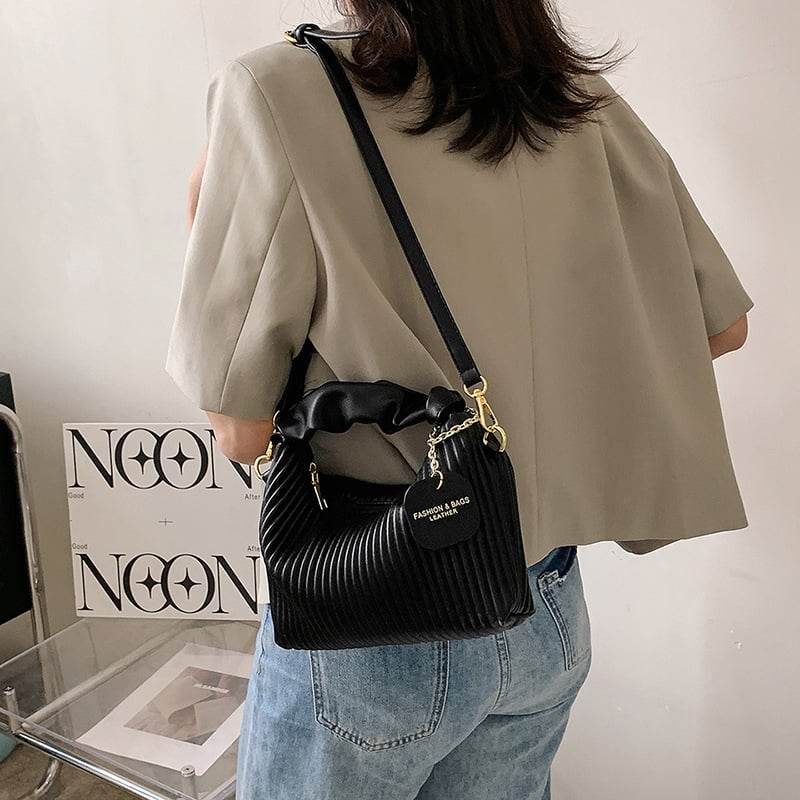 Textured vertical stripe handbag 2025 new niche design shoulder messenger bag foreign style all-match bag women's wholesale - Price Value Store